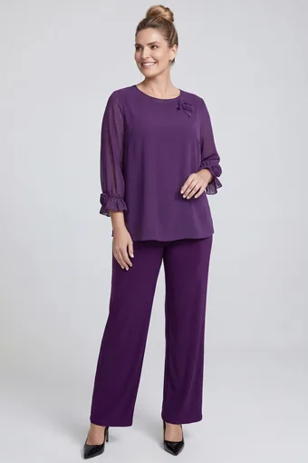 coordinato viola con applicazioni floreali