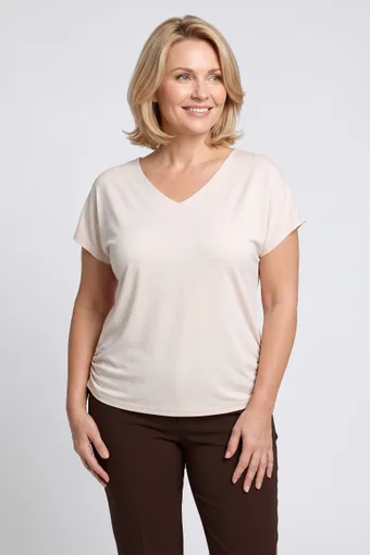 Camicetta beige con arricciature modellanti